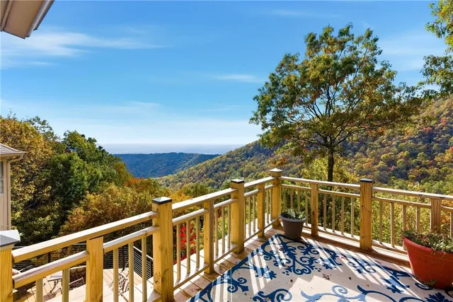 a view of a balcony with furniture