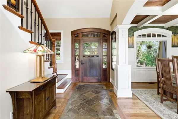 a view of entryway with a front door