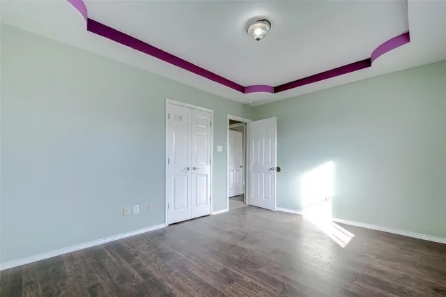 a very nice looking room with wooden floor