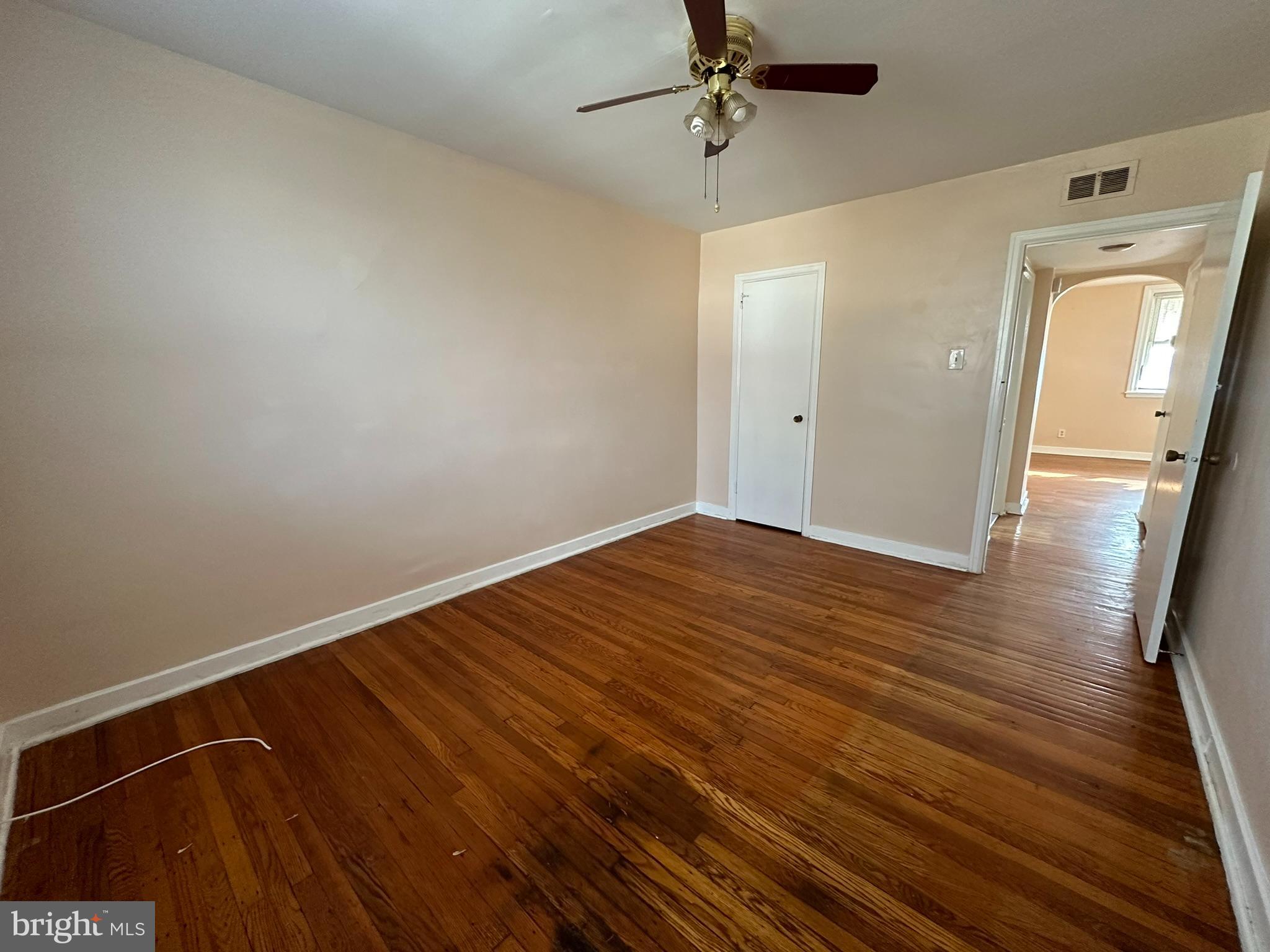 517 East Tabor Road, Unit 2 Philadelphia, PA 19120 - Photo 16 of 23 a view of a room with wooden floor and cabinet