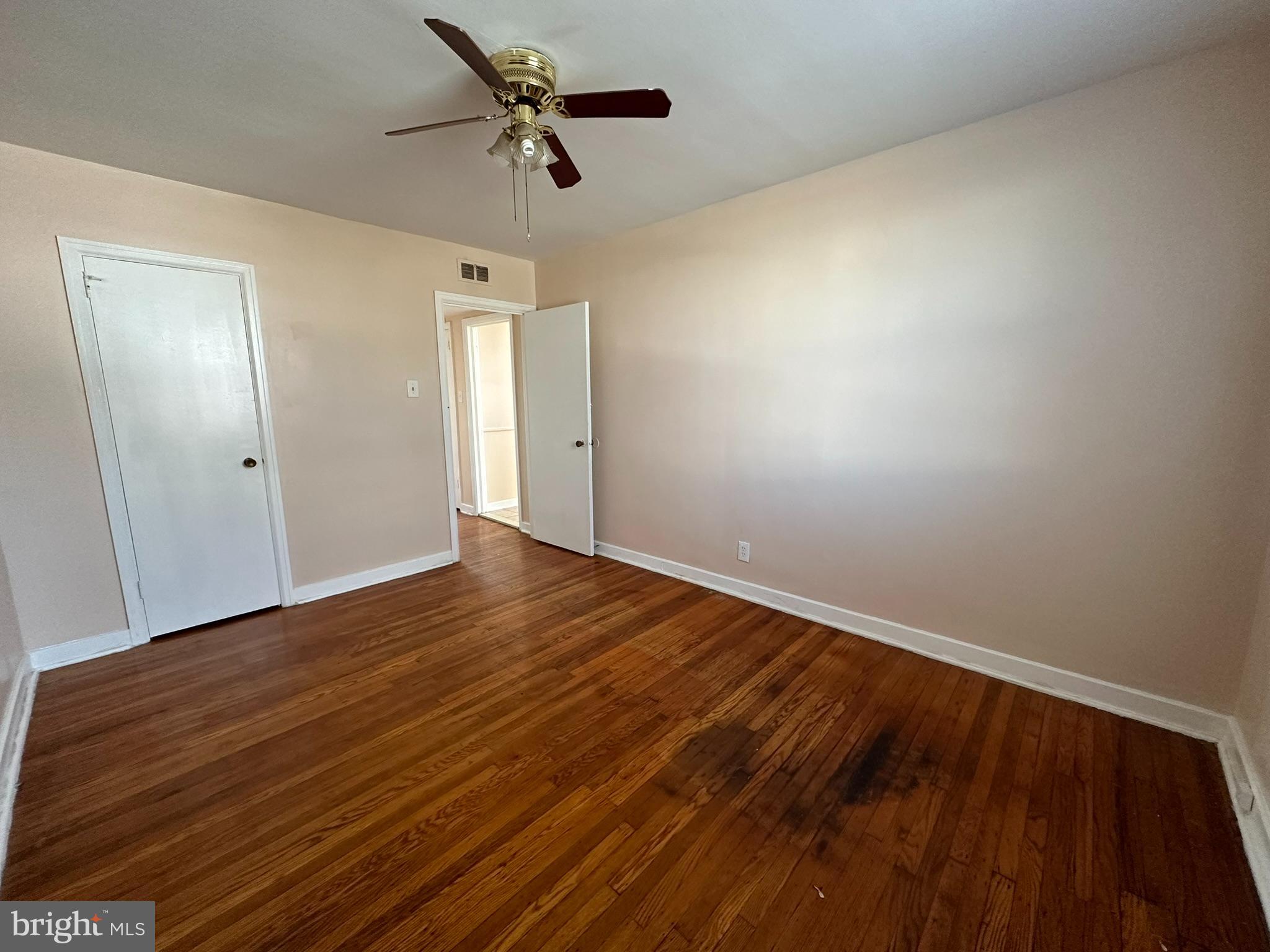 517 East Tabor Road, Unit 2 Philadelphia, PA 19120 - Photo 17 of 23 wooden floor in an empty room