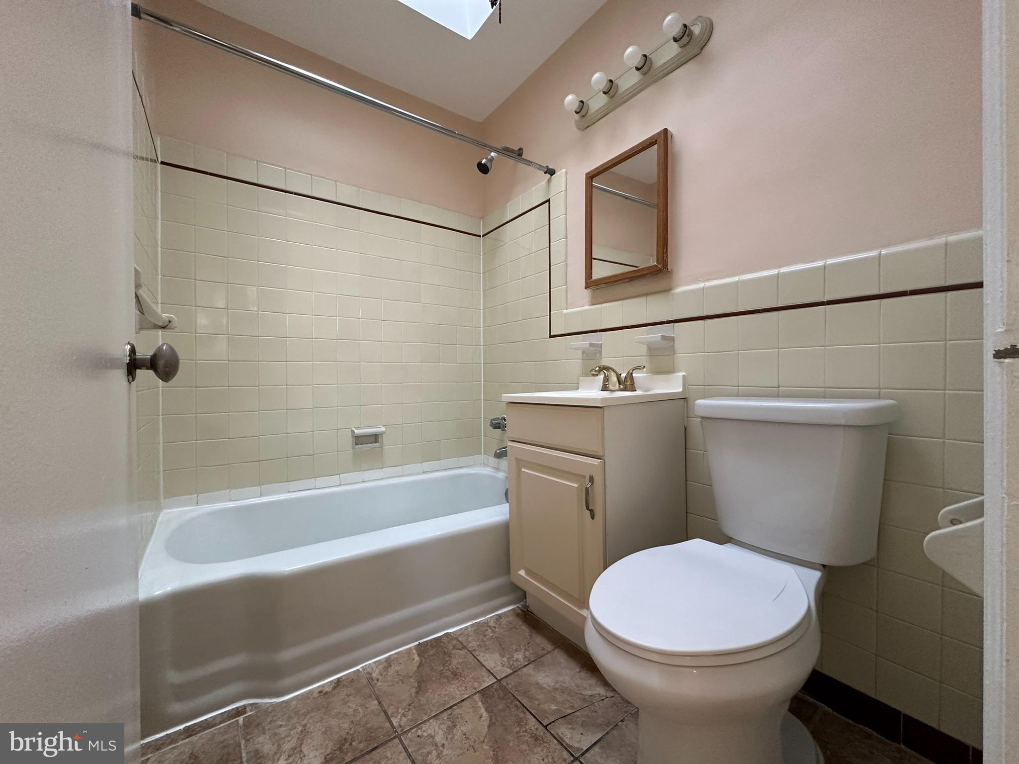 517 East Tabor Road, Unit 2 Philadelphia, PA 19120 - Photo 21 of 23 a bathroom with a sink toilet and shower