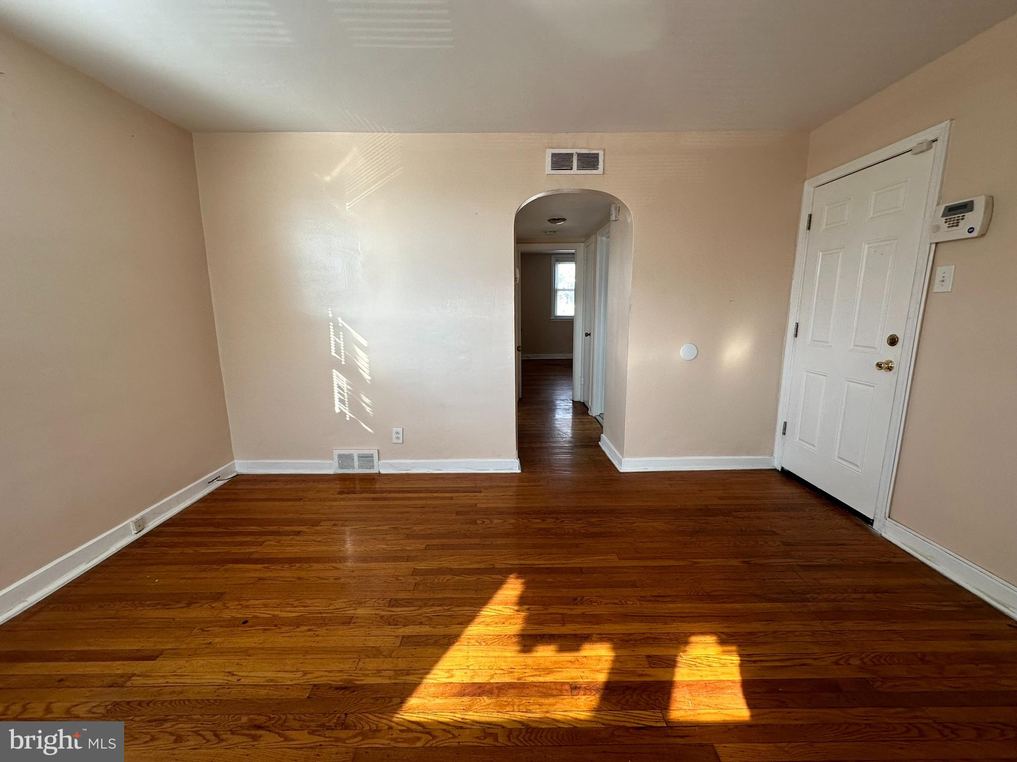 517 East Tabor Road, Unit 2 Philadelphia, PA 19120 - Photo 7 of 23 a view of empty room with wooden floor