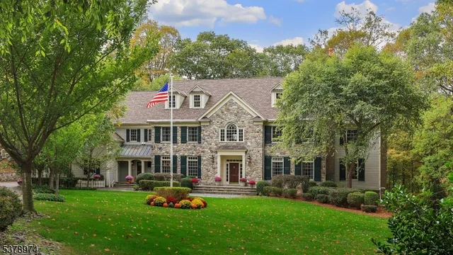 a aerial view of a house with a yard