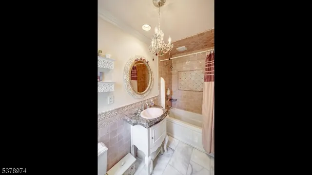 a view of a large yard with plants and trees