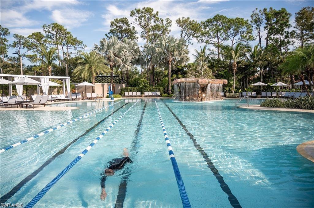 2701 Buckthorn Way Naples, FL 34105 - Photo 44 of 48 a view of a swimming pool with a patio