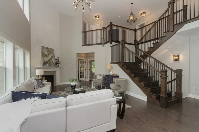 a living room with furniture or fireplace and a chandelier