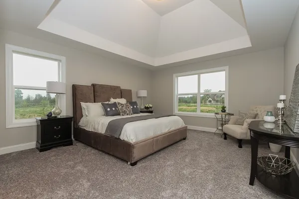 a bed room with a bed and a couch