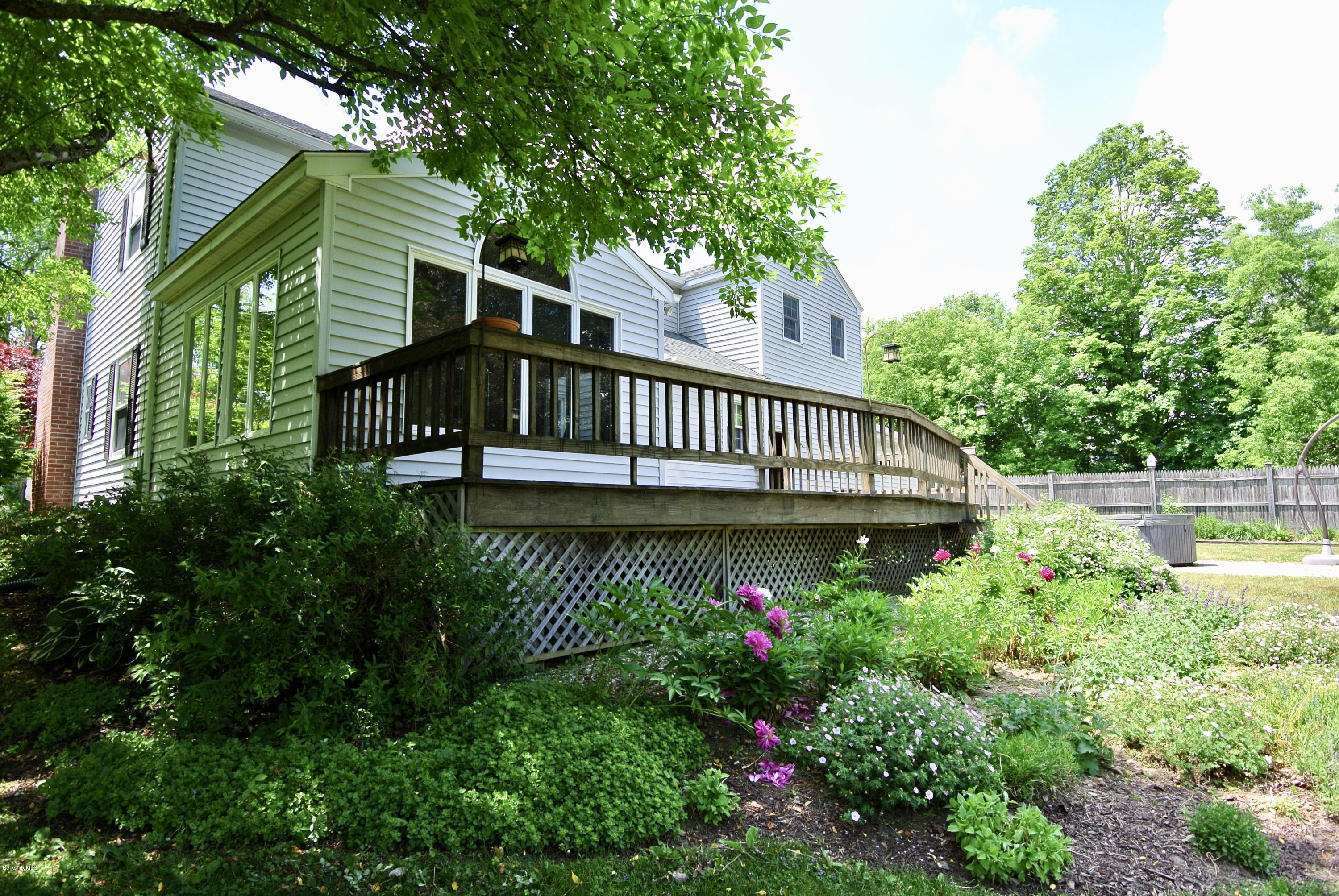 Perennial garden flanking the deck