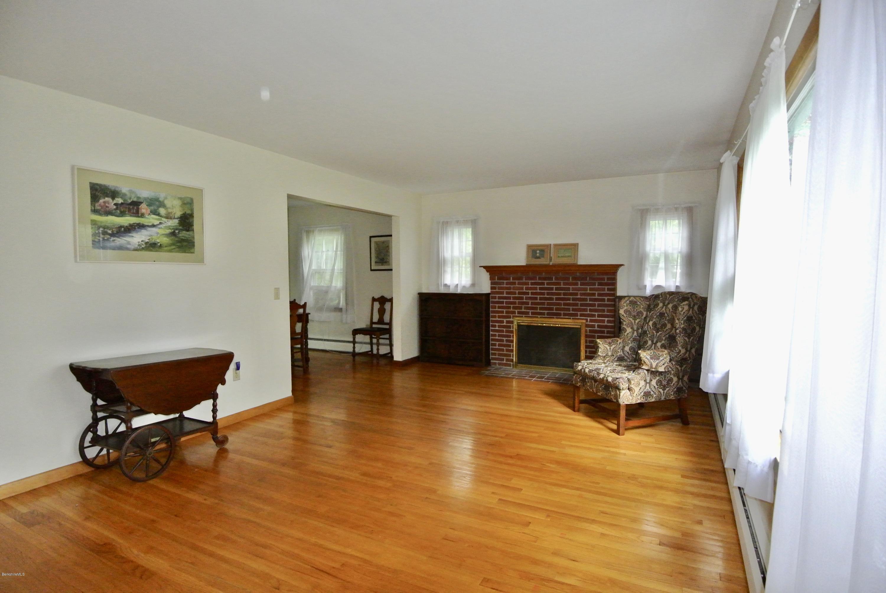 Bright living room with wood fireplace