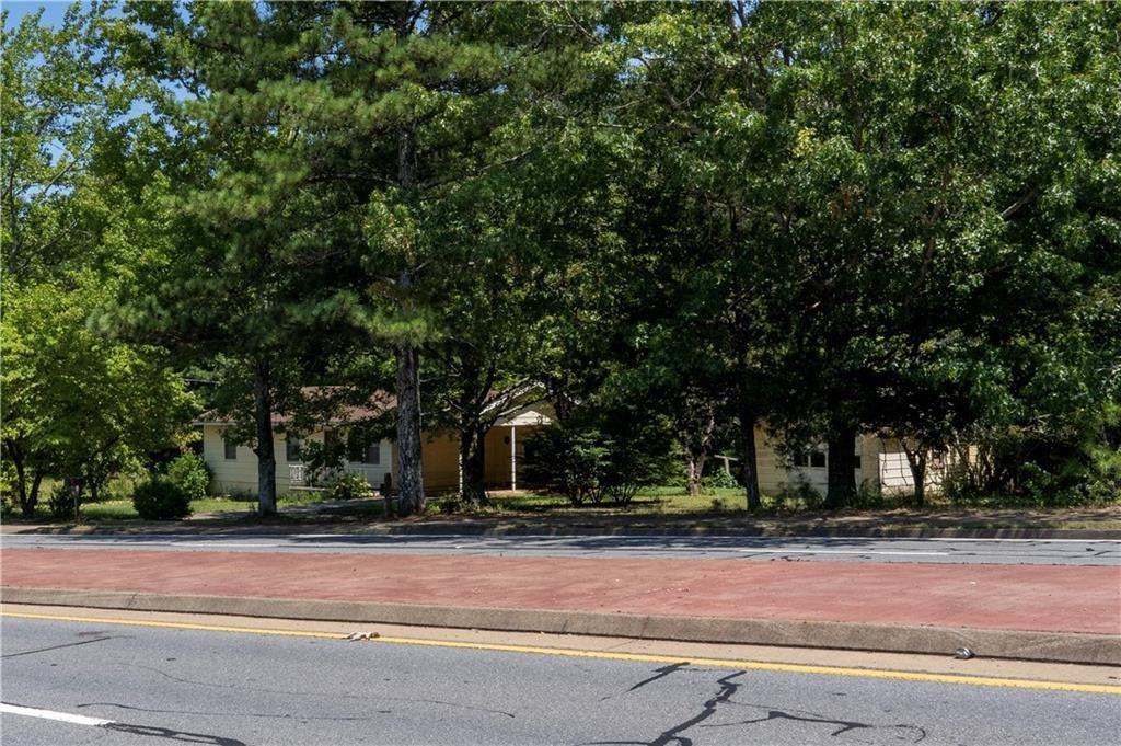 4556 Wade Green Road Northwest Acworth, GA 30102 - Photo 2 of 10 a view of a yard in front of a house