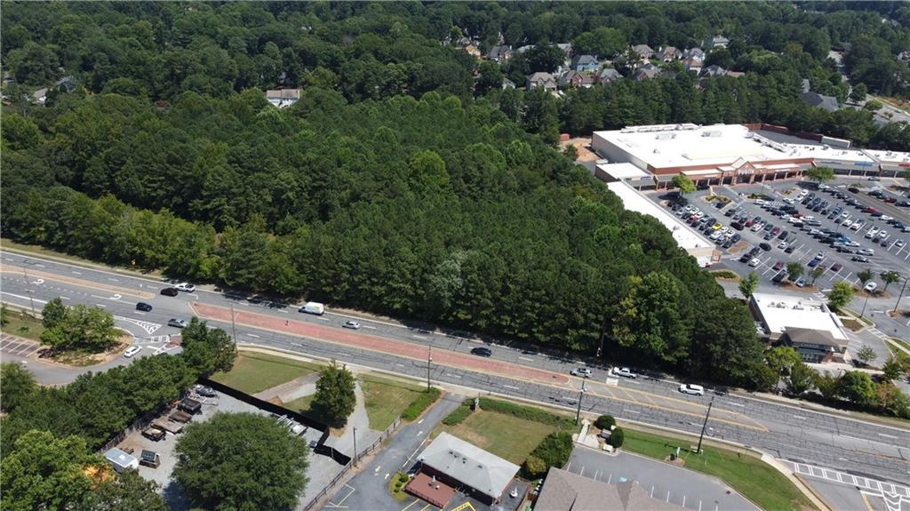 4556 Wade Green Road Northwest Acworth, GA 30102 - Photo 9 of 10 an aerial view of a house with a yard basket ball court and outdoor seating