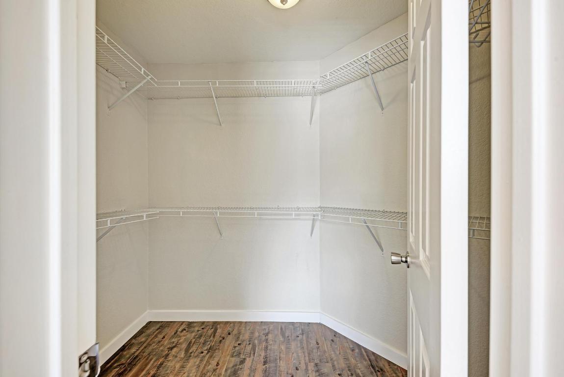 2317 Friarcreek Loop Round Rock, TX 78664 - Photo 23 of 36 a view of walk in closet with empty racks