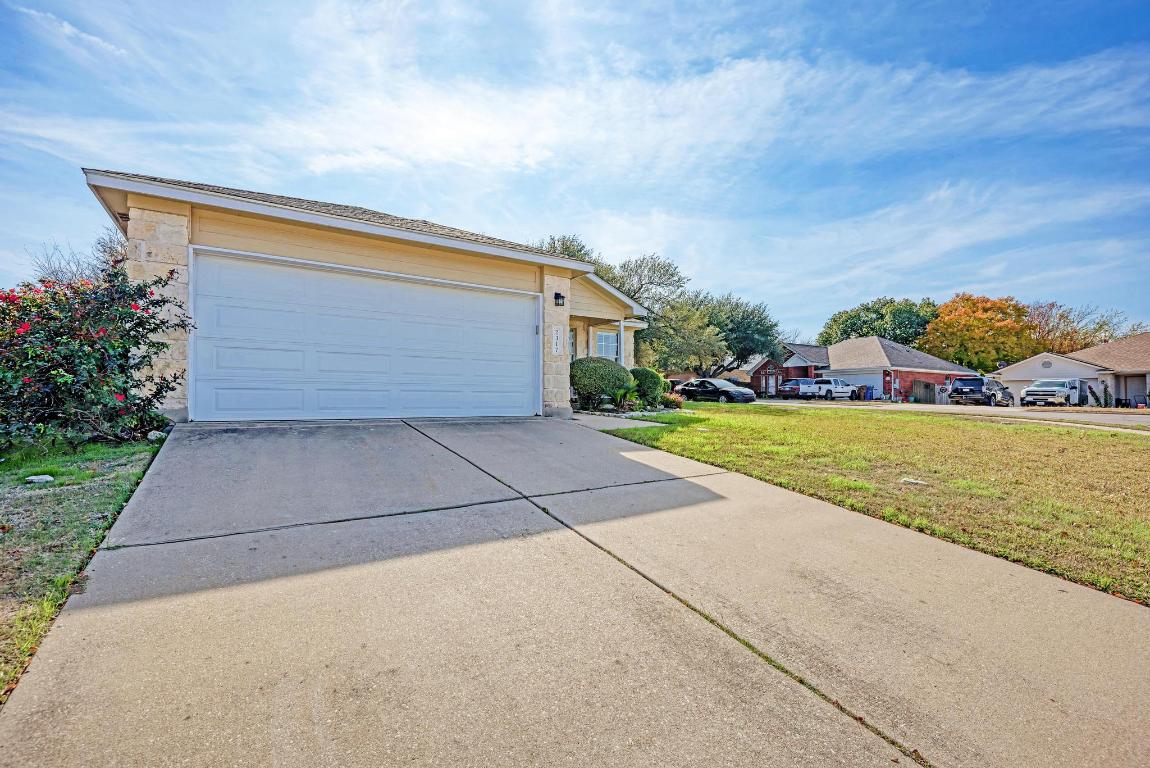2317 Friarcreek Loop Round Rock, TX 78664 - Photo 4 of 36 a view of front of house with outdoor space