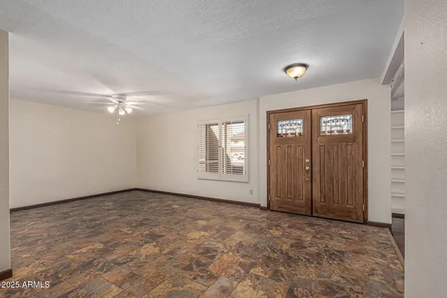 a bathroom with a double vanity sink mirror and shower