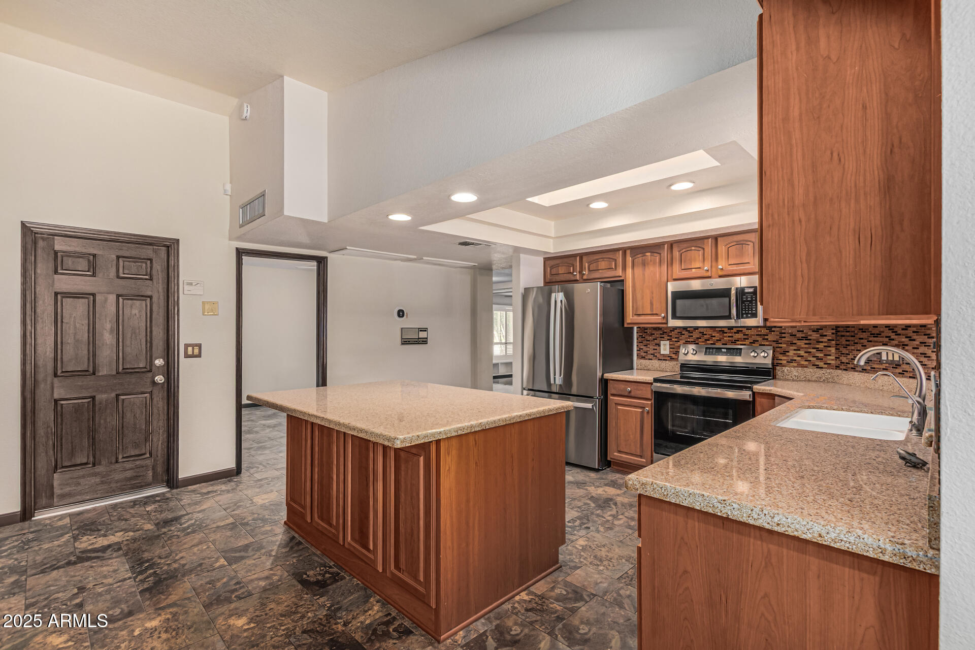 5109 East Kathleen Road Scottsdale, AZ 85254 - Photo 32 of 54 a kitchen with a stove a refrigerator and a sink