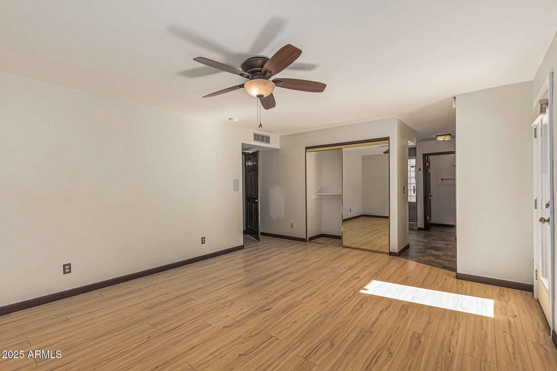 5109 East Kathleen Road Scottsdale, AZ 85254 - Photo 35 of 54 a view of empty room with wooden floor