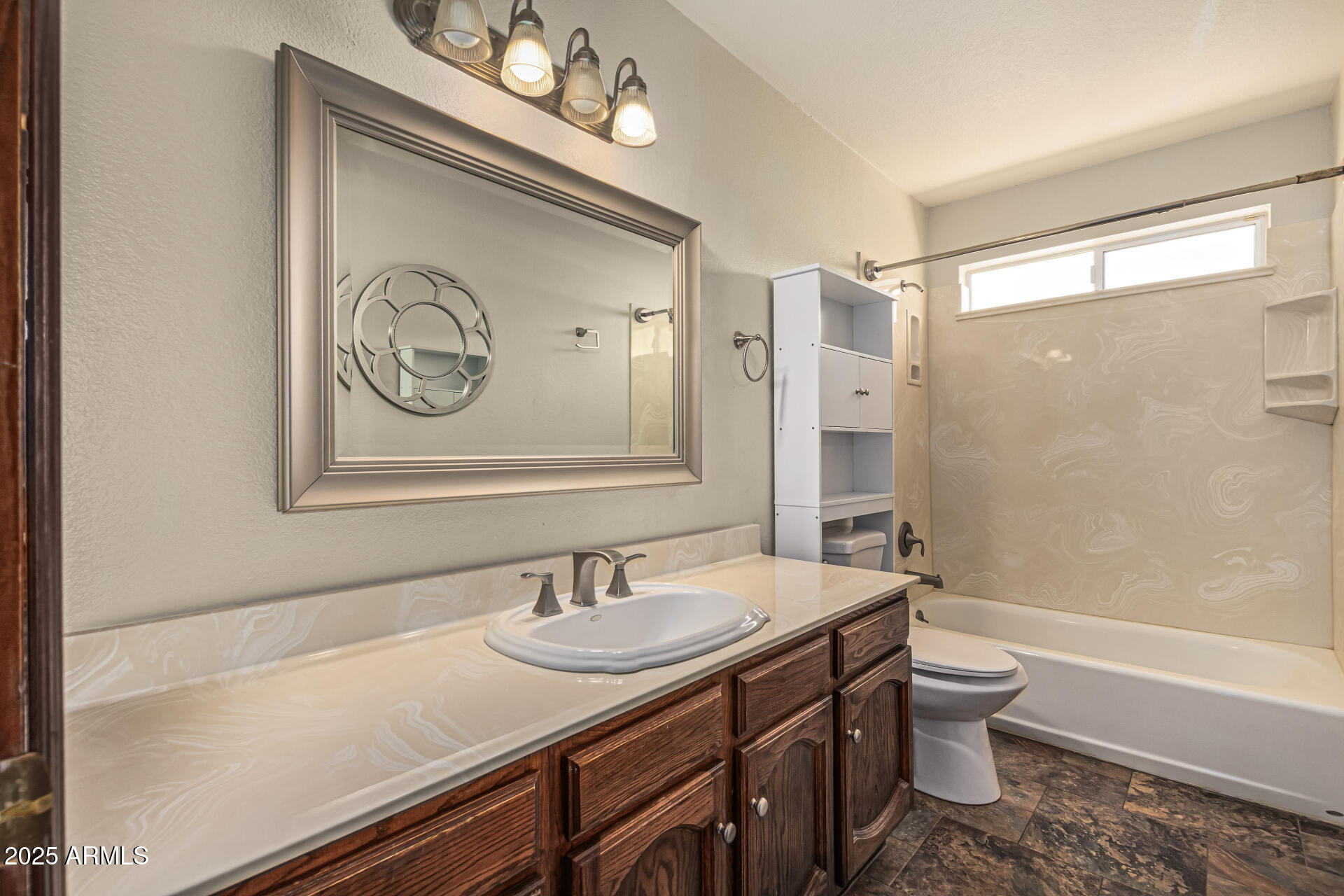 5109 East Kathleen Road Scottsdale, AZ 85254 - Photo 43 of 54 a bathroom with a sink a toilet and shower