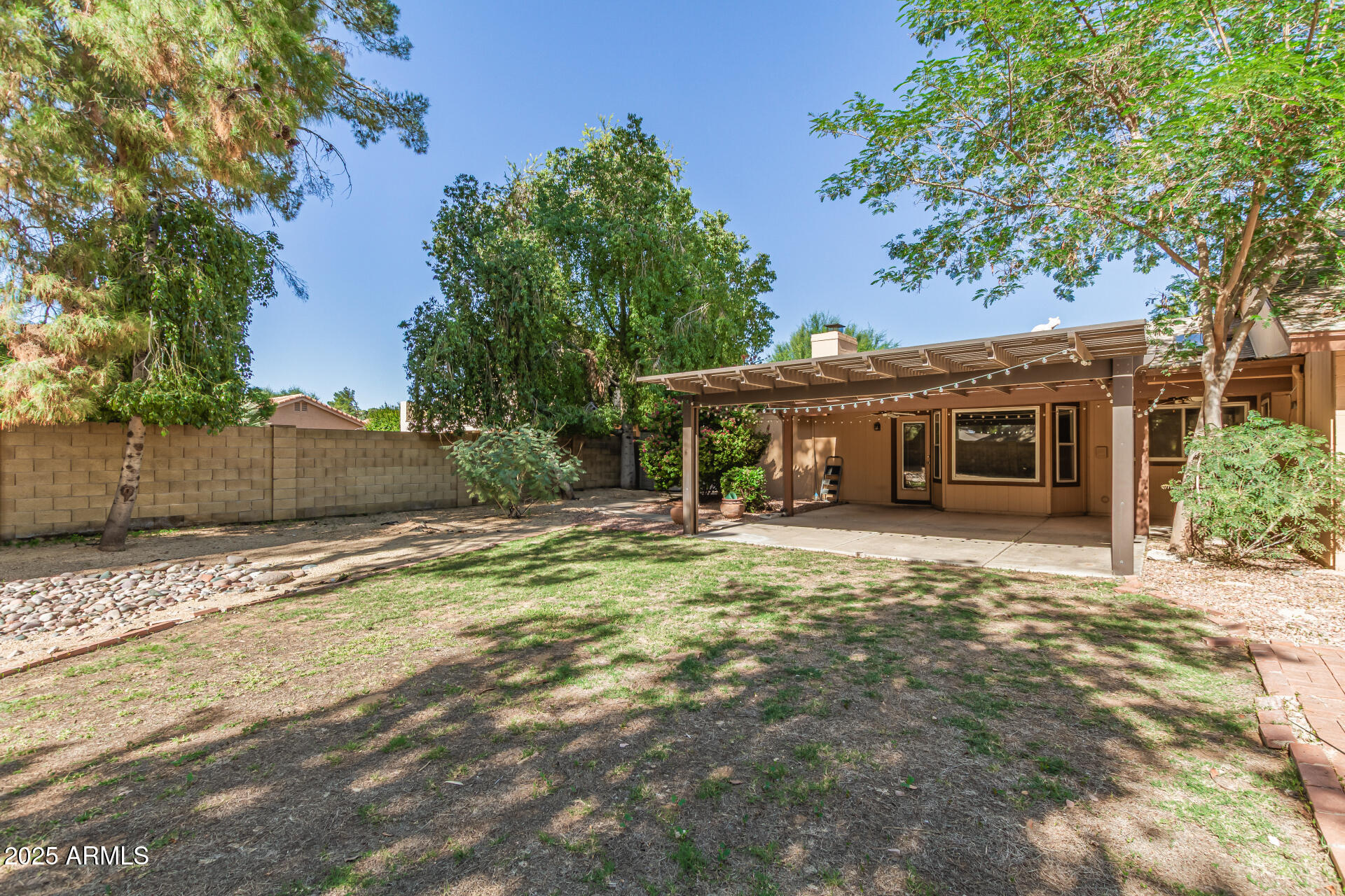 5109 East Kathleen Road Scottsdale, AZ 85254 - Photo 51 of 54 front view of a house with a garden