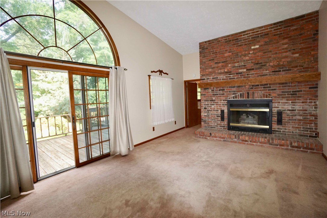 6490 Coleridge Road Painesville, OH 44077 - Photo 17 of 28 Family room with sliding door to rear deck