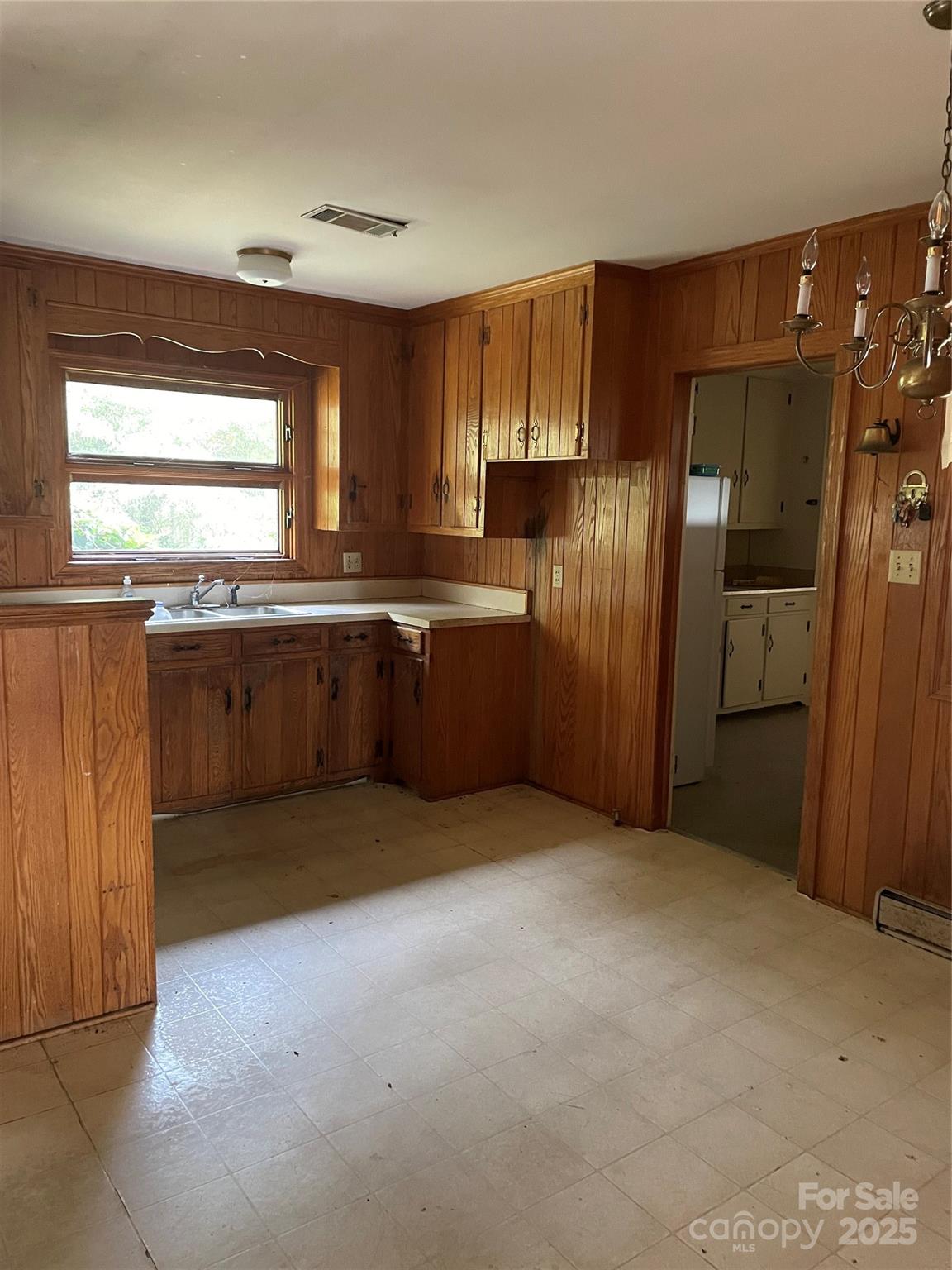 1450 Mt Tabor Church Road Cleveland, NC 27013 - Photo 4 of 14 a view of a kitchen with a sink and dishwasher a refrigerator