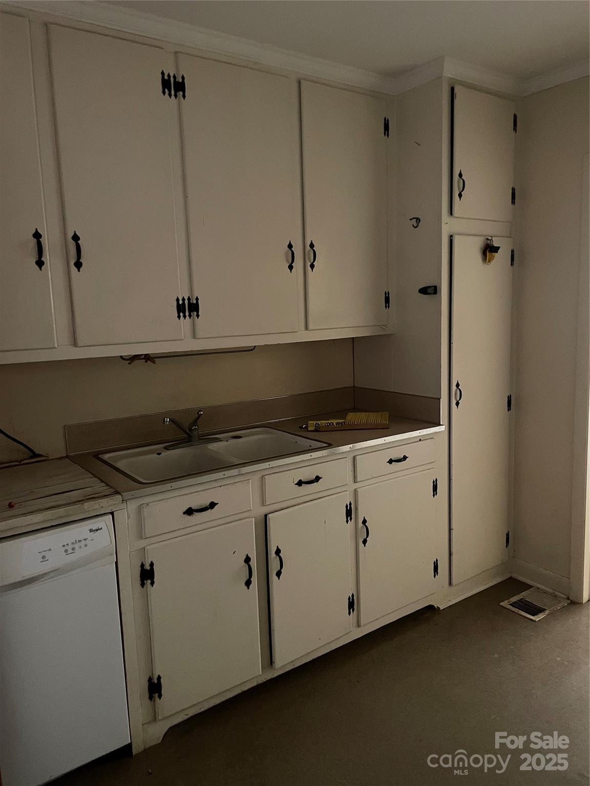 1450 Mt Tabor Church Road Cleveland, NC 27013 - Photo 5 of 14 a kitchen with granite countertop white cabinets and white appliances