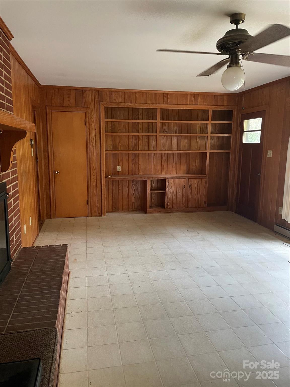 1450 Mt Tabor Church Road Cleveland, NC 27013 - Photo 6 of 14 a view of an empty room with a fireplace