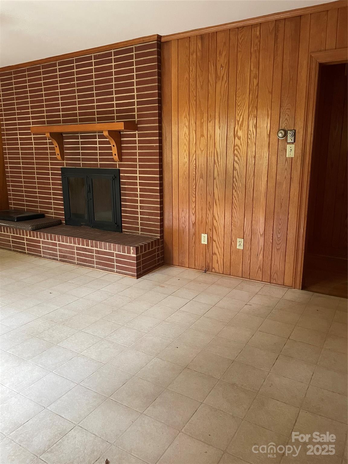 1450 Mt Tabor Church Road Cleveland, NC 27013 - Photo 7 of 14 a view of an empty room with wooden walls