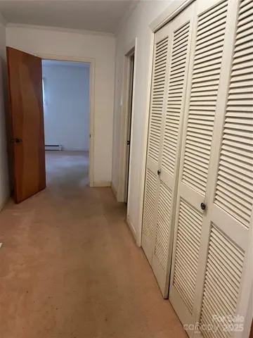 a view of a room with windows