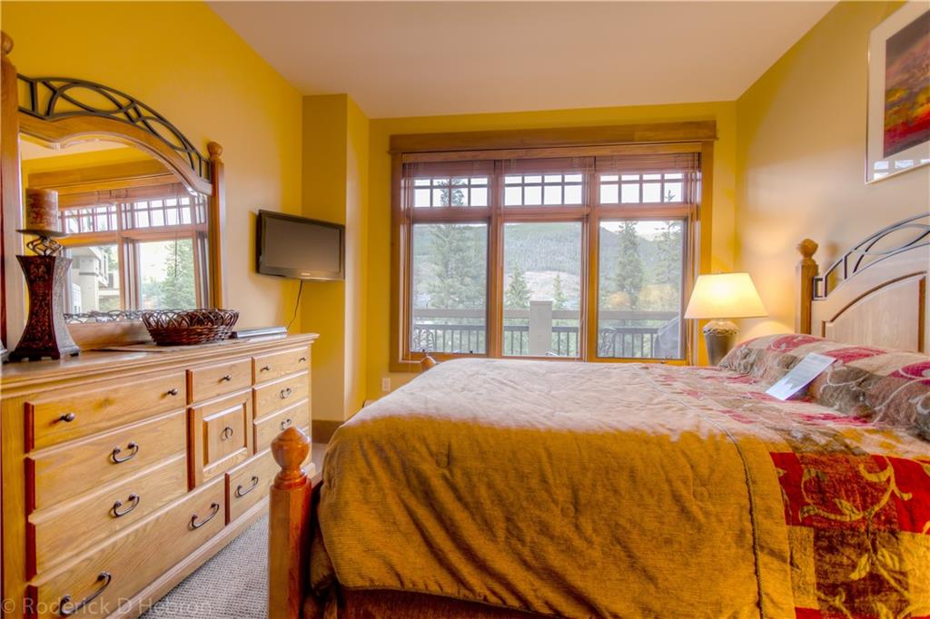 280 Trailhead Drive, Unit 3043 Keystone, CO 80435 - Photo 13 of 24 a bed sitting in a bedroom next to a window