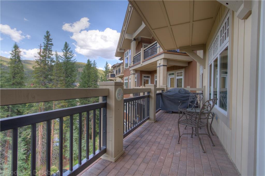 280 Trailhead Drive, Unit 3043 Keystone, CO 80435 - Photo 17 of 24 a view of a chair and tables in the balcony
