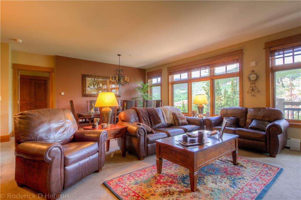 280 Trailhead Drive, Unit 3043 Keystone, CO 80435 - Photo 3 of 24 a living room with furniture and a large window