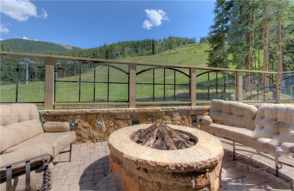 280 Trailhead Drive, Unit 3043 Keystone, CO 80435 - Photo 22 of 24 a view of a patio with couches table and chairs
