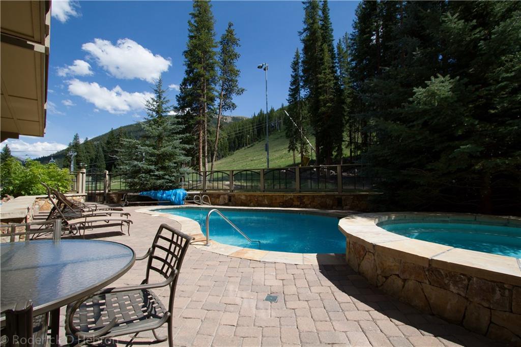 280 Trailhead Drive, Unit 3043 Keystone, CO 80435 - Photo 23 of 24 a view of swimming pool with outdoor seating and plants