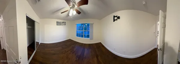 wooden floor in a hall with an entryway