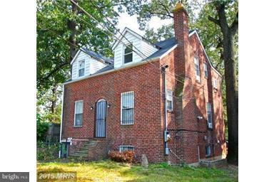 Large Brick Colonial w/ basement apt.