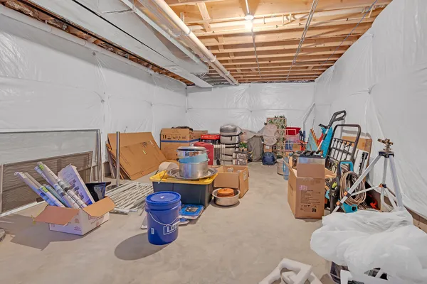 a view of a storage room with racks on the wall