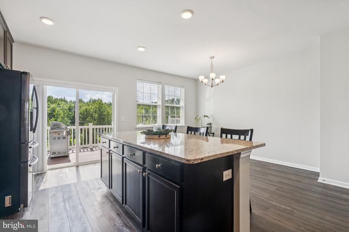 16 Naples Lane Mount Laurel, NJ 08054 - Photo 13 of 30 a kitchen with a sink and wooden floor