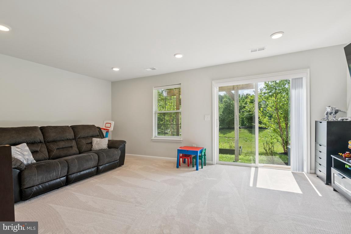 16 Naples Lane Mount Laurel, NJ 08054 - Photo 6 of 30 a living room with furniture and a flat screen tv