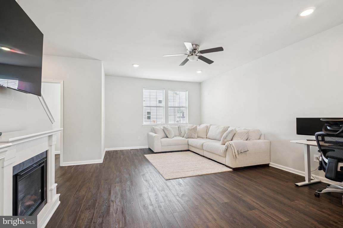16 Naples Lane Mount Laurel, NJ 08054 - Photo 8 of 30 a living room with furniture a fireplace and a flat screen tv