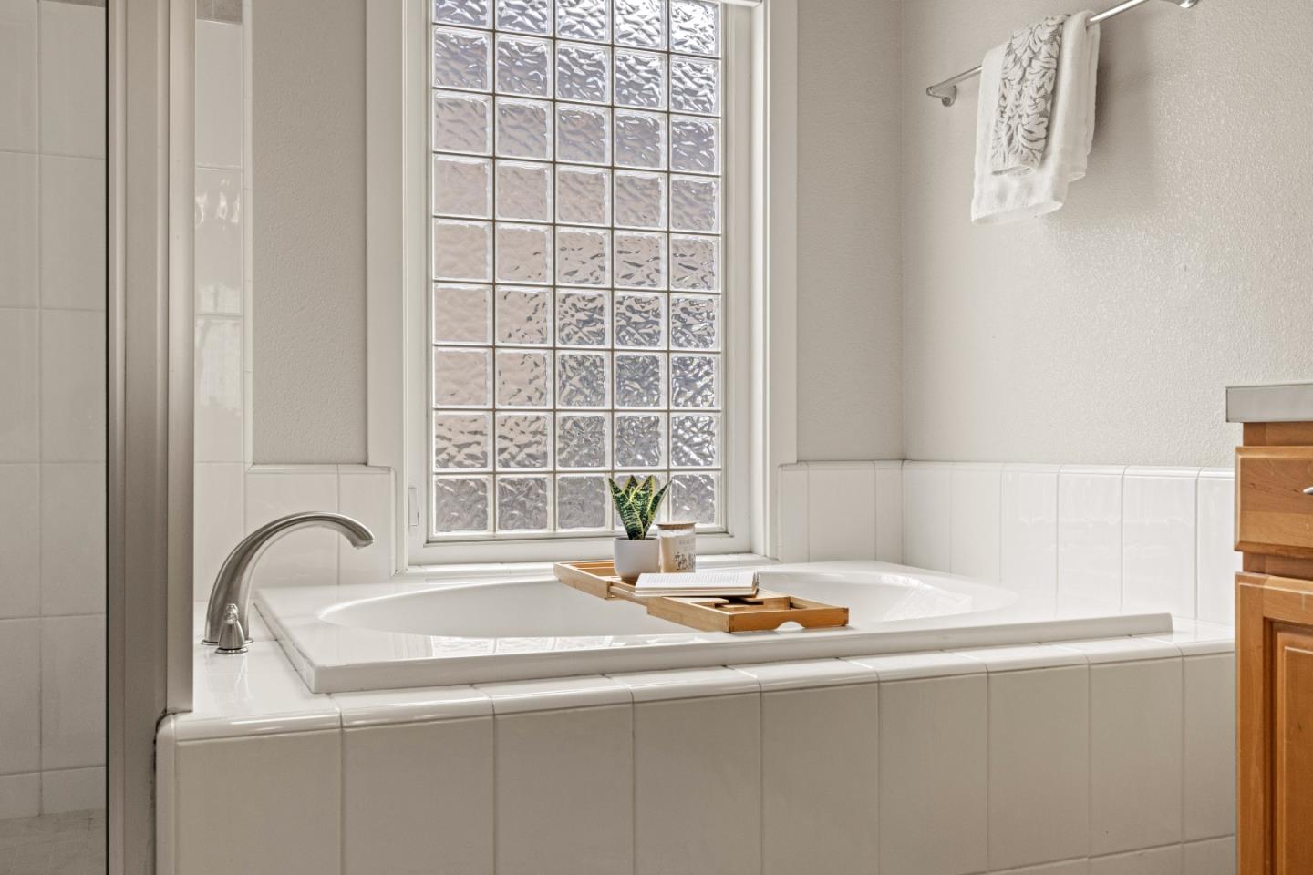 2549 Colonial Circle Watsonville, CA 95076 - Photo 27 of 54 a bathroom with a bathtub and a sink