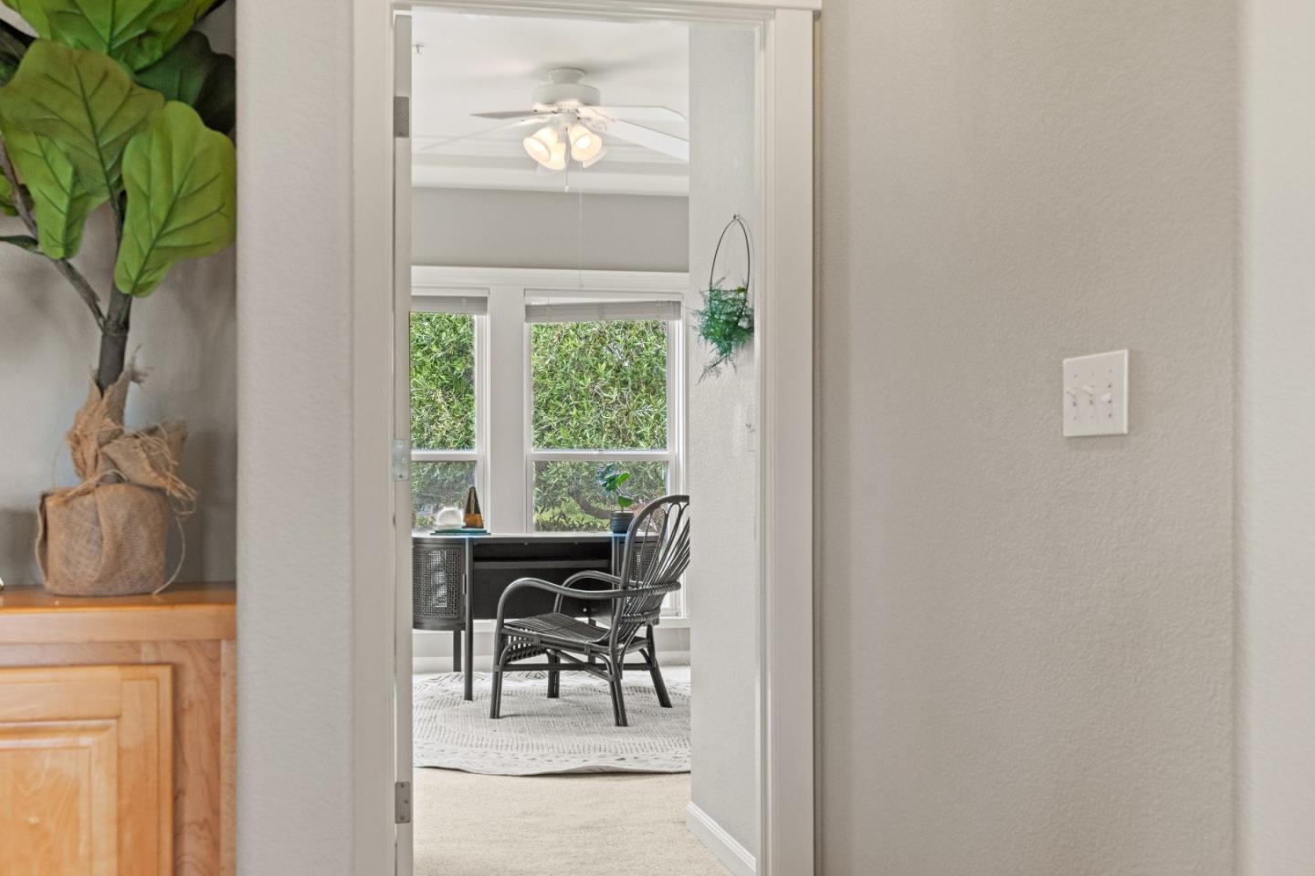 2549 Colonial Circle Watsonville, CA 95076 - Photo 37 of 54 a view of a workspace with furniture and a window