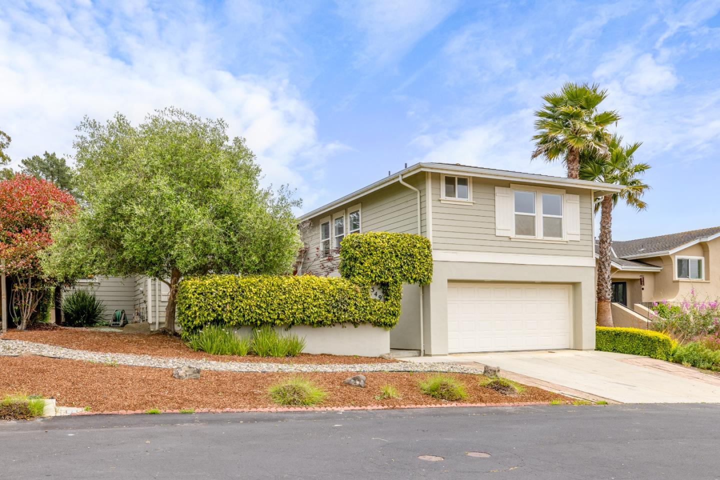 2549 Colonial Circle Watsonville, CA 95076 - Photo 53 of 54 a front view of a house with a yard and garage