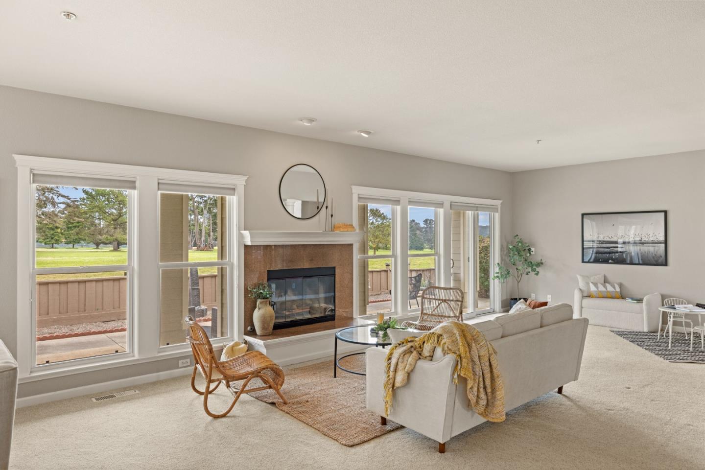 2549 Colonial Circle Watsonville, CA 95076 - Photo 7 of 54 a living room with furniture a fireplace and a large window