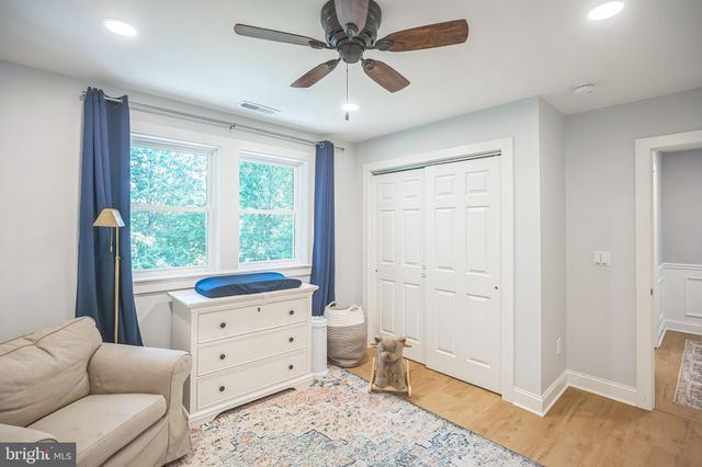 a kitchen with a sink cabinets and appliances