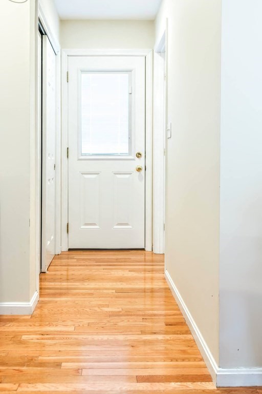 8 Spinney Path Lynn, MA 01902 - Photo 16 of 42 a view of an empty room with wooden floor