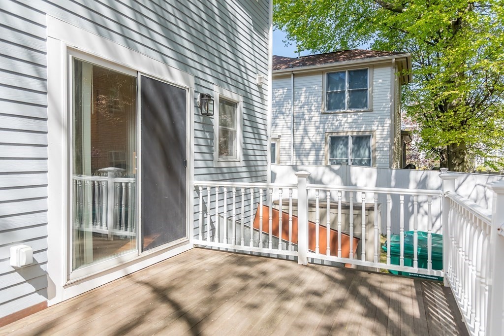 8 Spinney Path Lynn, MA 01902 - Photo 19 of 42 a view of backyard with a small cabin and wooden fence