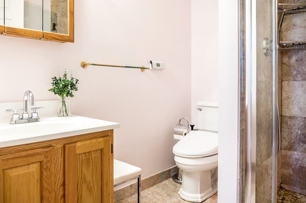 8 Spinney Path Lynn, MA 01902 - Photo 31 of 42 a bathroom with a sink a toilet and shower