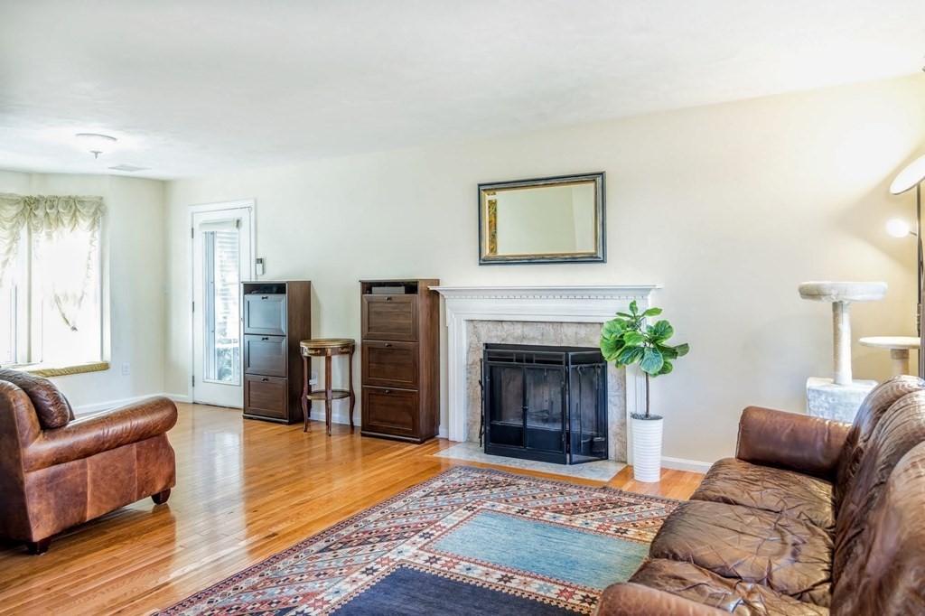 8 Spinney Path Lynn, MA 01902 - Photo 6 of 42 a living room with furniture and a fireplace