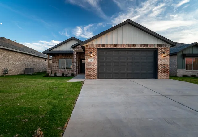 a front view of house with yard